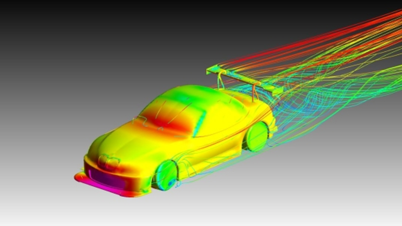 Why is the height of a racing car kept small?